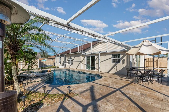 view of pool featuring a patio and a lanai