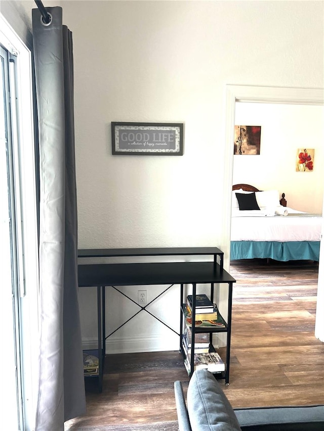 bedroom with wood-type flooring