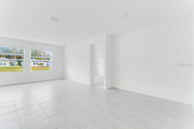 view of tiled spare room