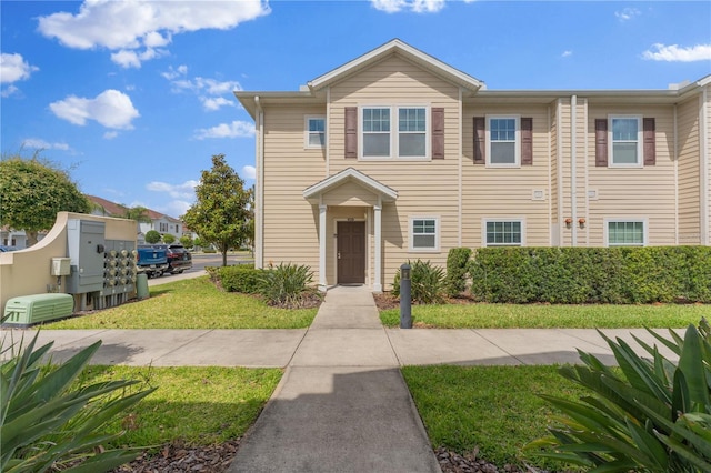 view of front of home with a front yard