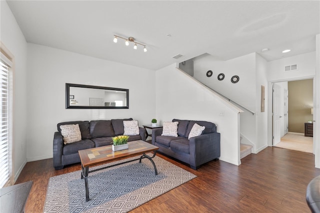 living room featuring dark hardwood / wood-style flooring