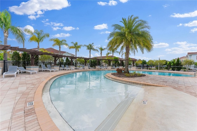 view of swimming pool featuring a patio area