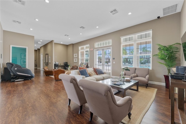 living room featuring french doors and dark hardwood / wood-style floors