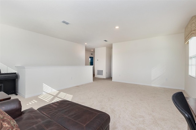 living room featuring light colored carpet