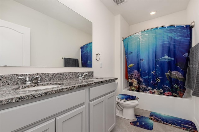 full bathroom featuring vanity, tile patterned floors, toilet, and shower / tub combo with curtain