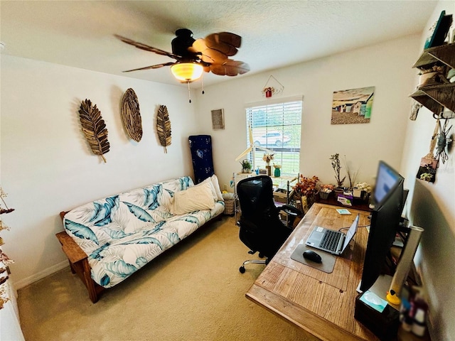 office featuring ceiling fan and carpet flooring