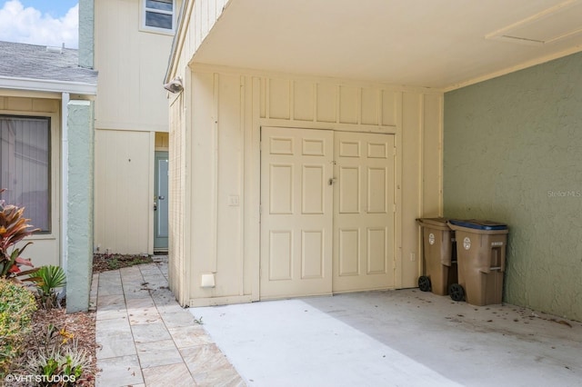 doorway to property with a patio area