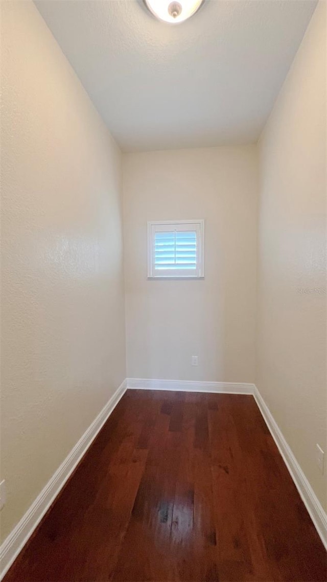 empty room featuring dark hardwood / wood-style floors