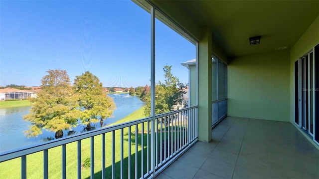 balcony featuring a water view