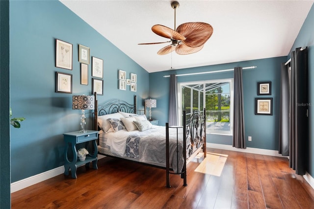 bedroom with lofted ceiling, dark wood-type flooring, access to exterior, and ceiling fan