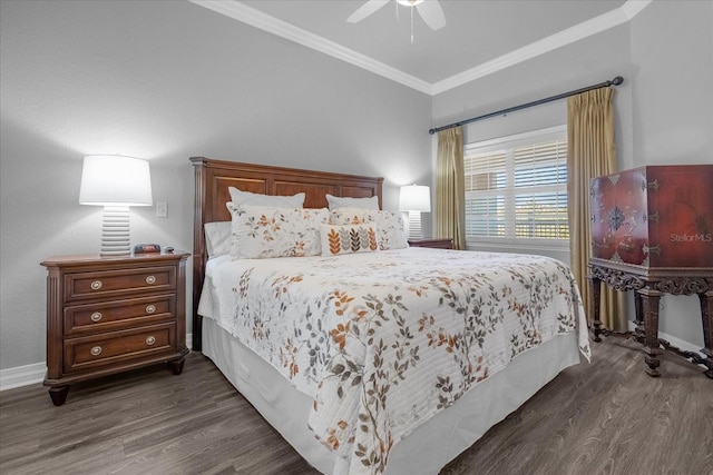 bedroom featuring ceiling fan, dark hardwood / wood-style floors, and ornamental molding