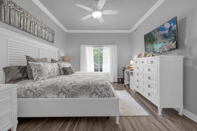 bedroom with wood-type flooring, ornamental molding, and ceiling fan