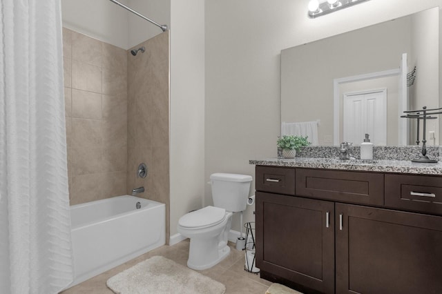 full bathroom with vanity, toilet, shower / tub combo, and tile patterned flooring