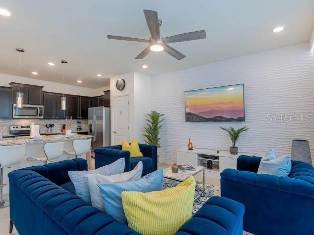 living room featuring ceiling fan