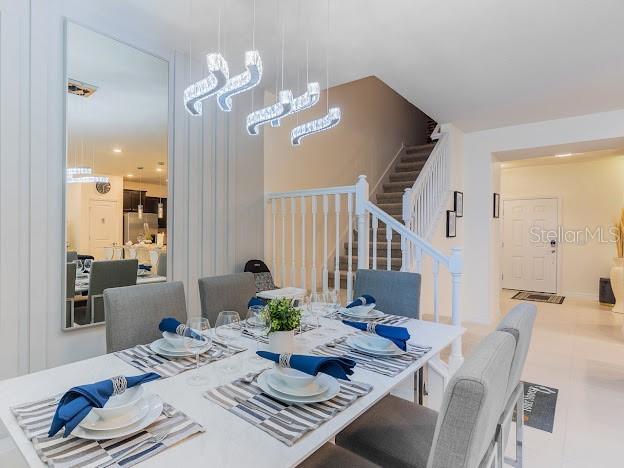 dining room with a notable chandelier