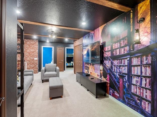 interior space featuring ceiling fan and a textured ceiling