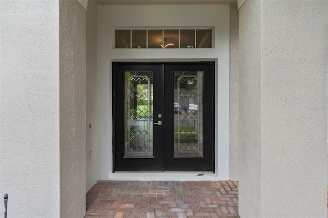 doorway to property featuring french doors