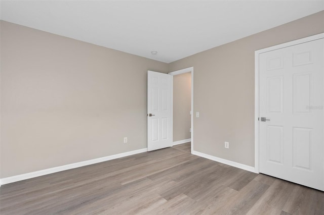 unfurnished bedroom featuring light hardwood / wood-style flooring