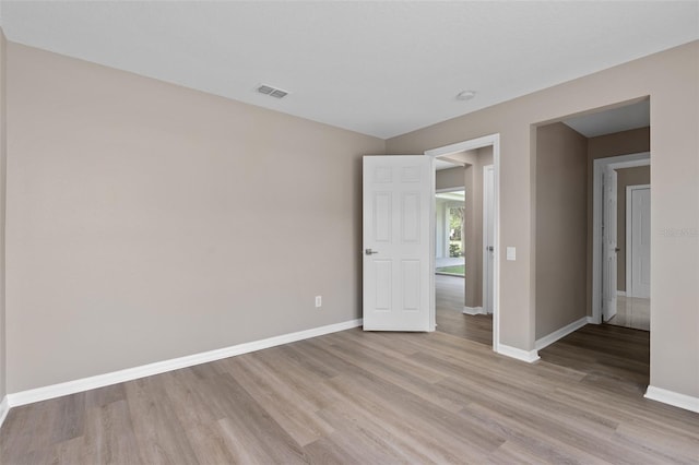 empty room featuring light hardwood / wood-style floors