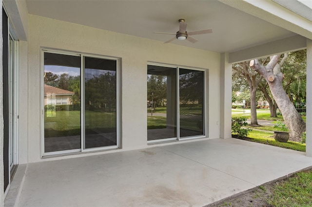 view of patio featuring ceiling fan