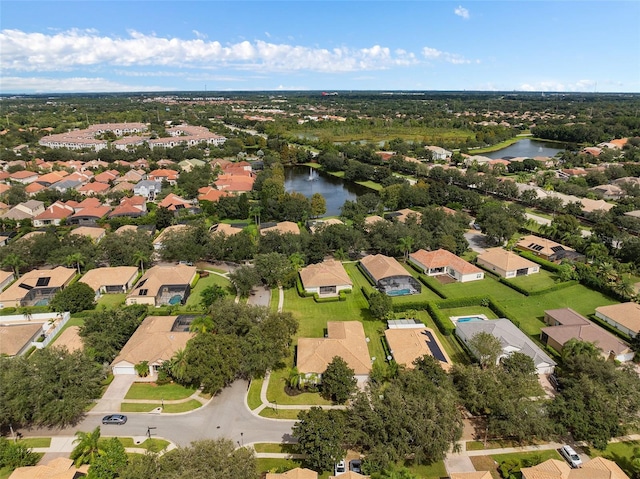 drone / aerial view with a water view