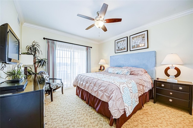 bedroom featuring ceiling fan and ornamental molding