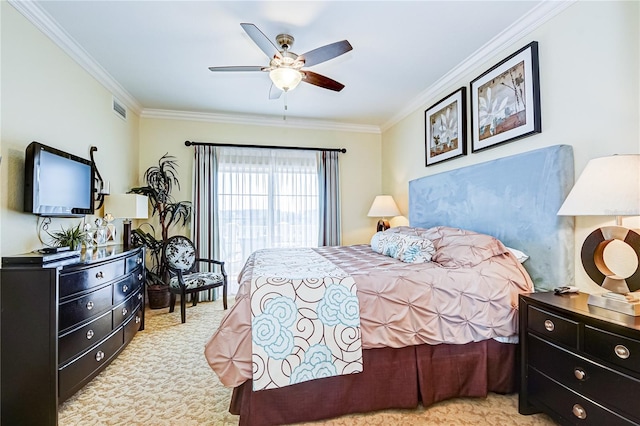 carpeted bedroom with crown molding and ceiling fan