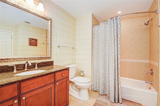 full bathroom with toilet, shower / bath combination with curtain, vanity, and tile patterned floors