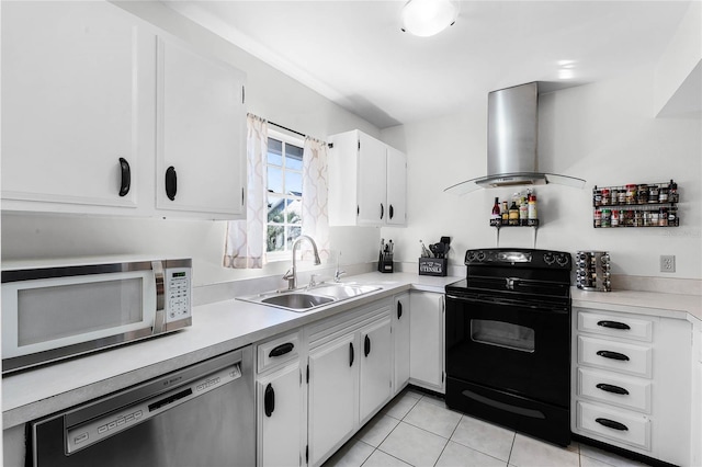 kitchen with island range hood, sink, white cabinets, and appliances with stainless steel finishes