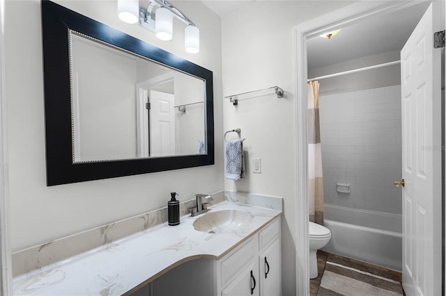 full bathroom featuring shower / tub combo with curtain, vanity, and toilet