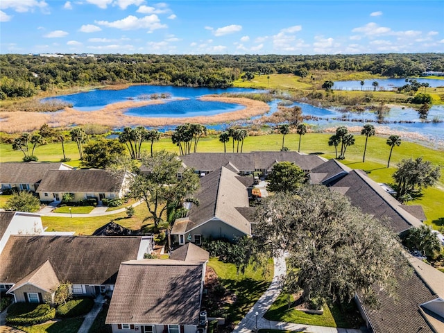 drone / aerial view with a water view