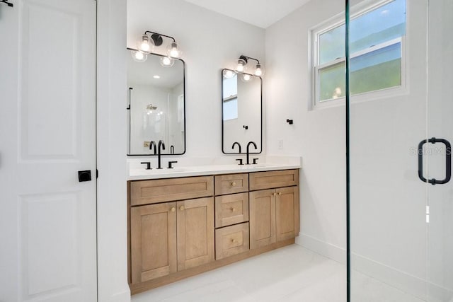 bathroom with vanity, tile patterned flooring, and an enclosed shower