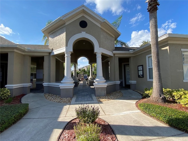 doorway to property featuring covered porch