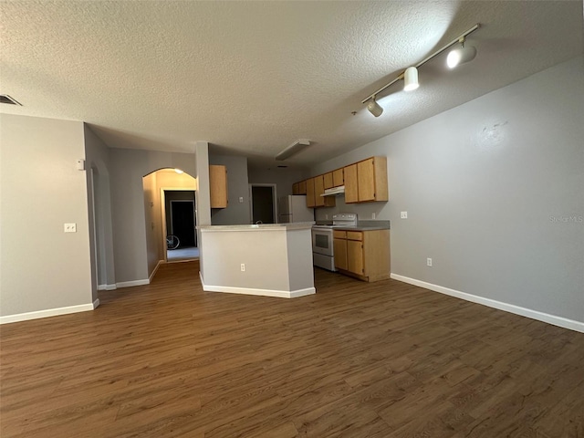 kitchen featuring electric range, dark hardwood / wood-style flooring, a textured ceiling, and white refrigerator