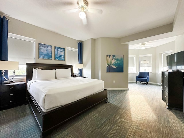 carpeted bedroom featuring ceiling fan