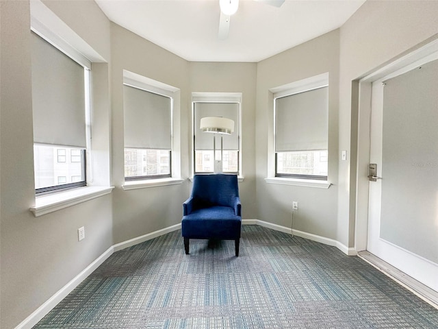 unfurnished room with ceiling fan and a wealth of natural light