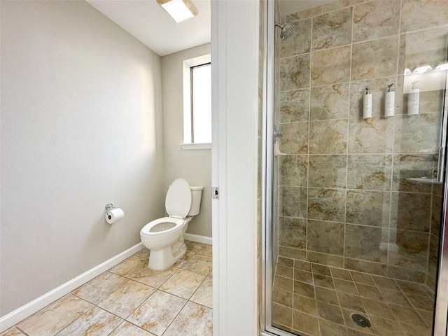 bathroom featuring toilet, an enclosed shower, and tile patterned flooring