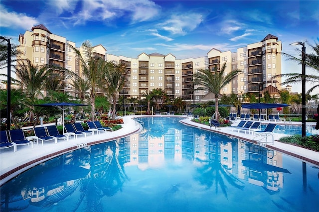 14501 Grove Resort Ave Unit 1507, Winter Garden, FL 34787 - community pool featuring a patio