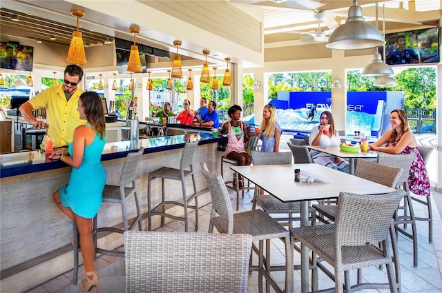 14501 Grove Resort Ave Unit 1507, Winter Garden, FL 34787 - view of patio with a bar and ceiling fan