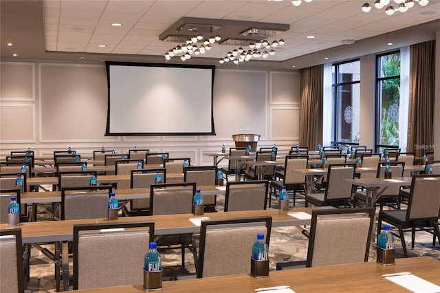 14501 Grove Resort Ave Unit 1507, Winter Garden, FL 34787 - home theater featuring a decorative wall and a paneled ceiling