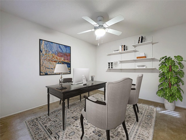 home office featuring a textured ceiling and ceiling fan