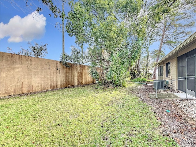 view of yard with a patio area and central AC unit