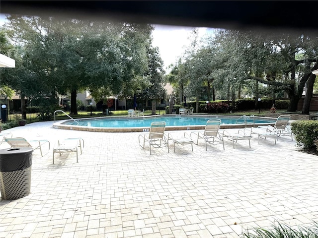 view of pool with a patio