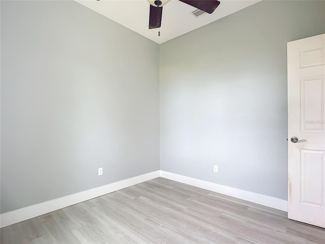 unfurnished room featuring light wood-type flooring and ceiling fan