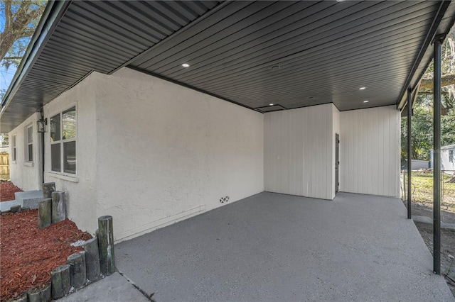 view of patio featuring a carport