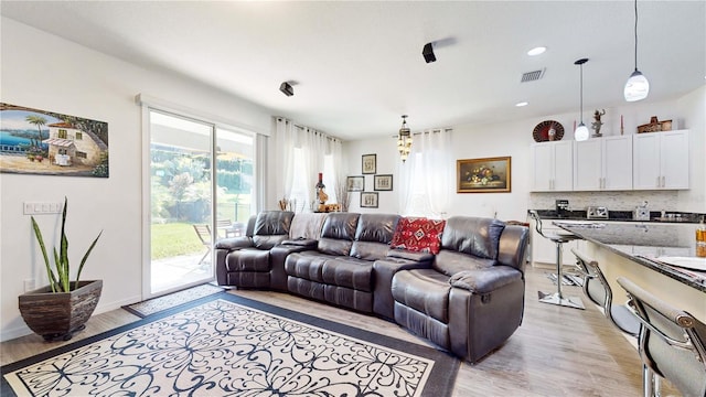 living room featuring light hardwood / wood-style flooring