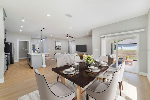13356 SW 64th Street Rd, Ocala, FL 34482 - dining space with light wood-style floors, recessed lighting, a ceiling fan, and baseboards