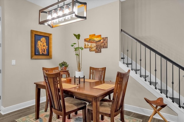 dining area featuring dark hardwood / wood-style floors