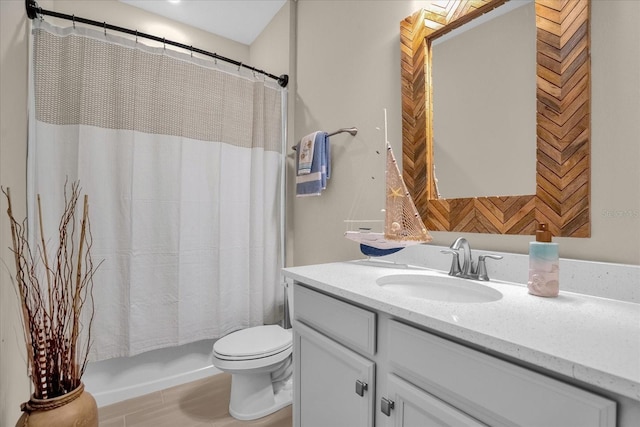 full bathroom with vanity, toilet, and shower / bath combo