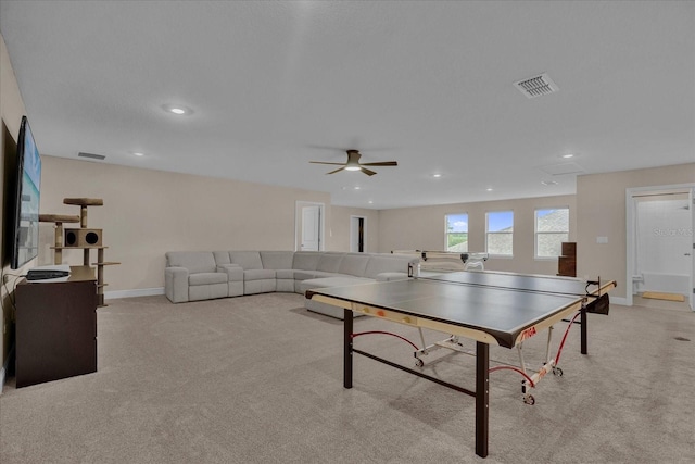 playroom featuring ceiling fan and light colored carpet